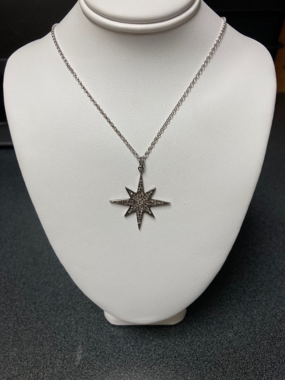 Genuine diamond starburst pendant on sterling silver chain
